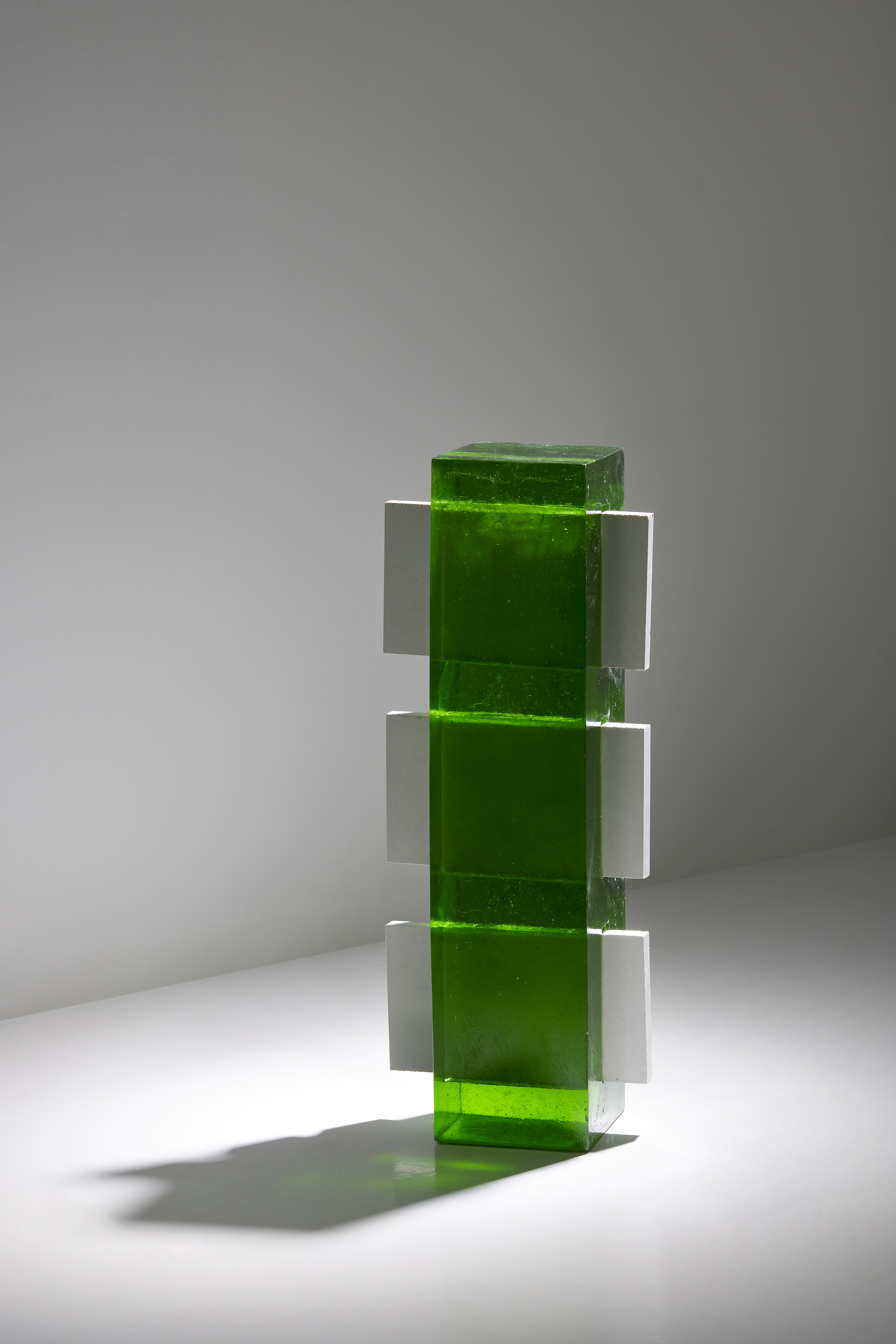 Untitled sculpture by oneg - cement and glass work exploring symmetry and body abstraction